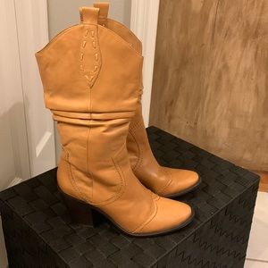 Leather boots. Only worn a few times. Run small.